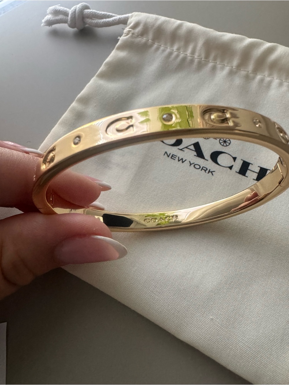 Coach Gold Tone Signature C Logo Bangle Bracelet